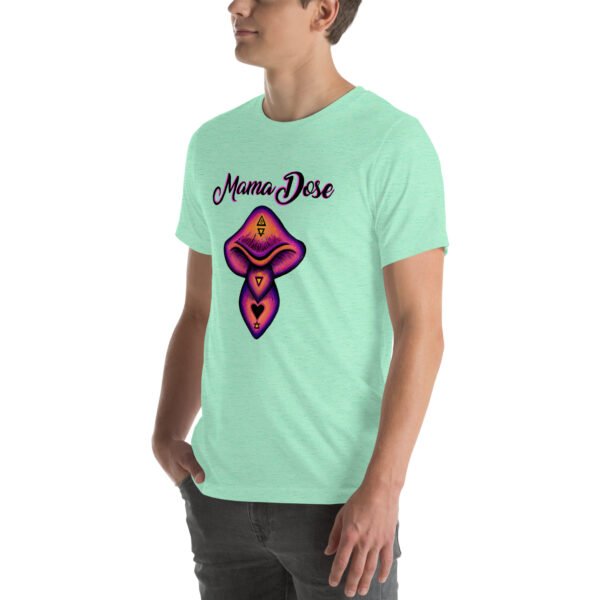 a person wearing mint green mama dose magic mushroom t shirt