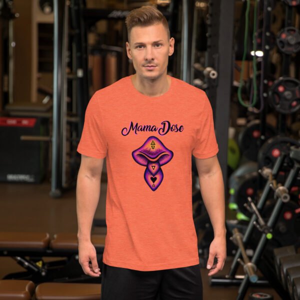 a person in the gym wearing a orange mama dose mushroom t shirt